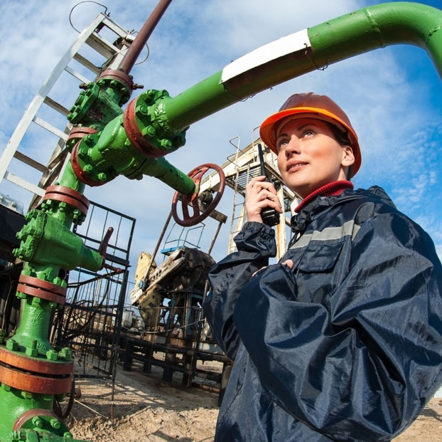 Woman on Oil Site with Radio